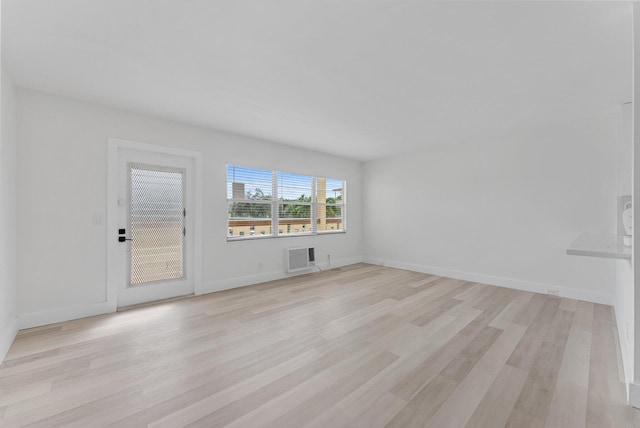 unfurnished living room with light hardwood / wood-style flooring