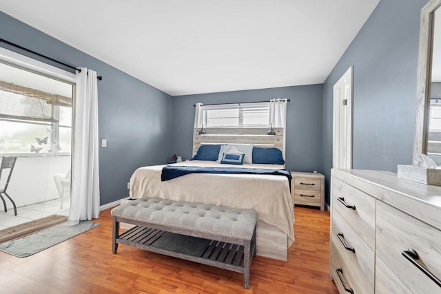 bedroom featuring light wood-type flooring