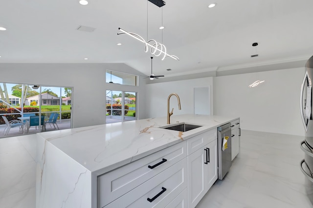 kitchen with white cabinets, hanging light fixtures, stainless steel dishwasher, an island with sink, and light stone counters