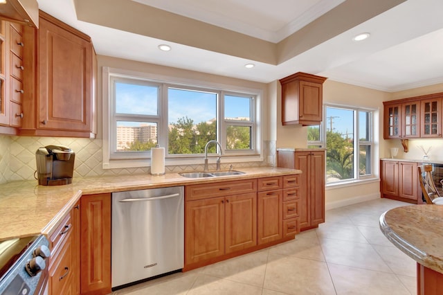 kitchen with sink, appliances with stainless steel finishes, decorative backsplash, light tile patterned floors, and ornamental molding