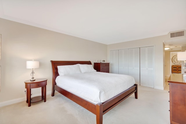 carpeted bedroom featuring a closet