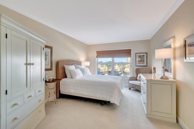 carpeted bedroom featuring crown molding