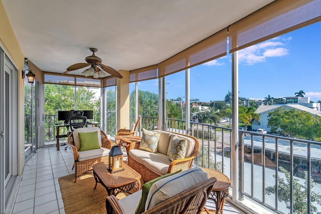 sunroom with ceiling fan and a healthy amount of sunlight