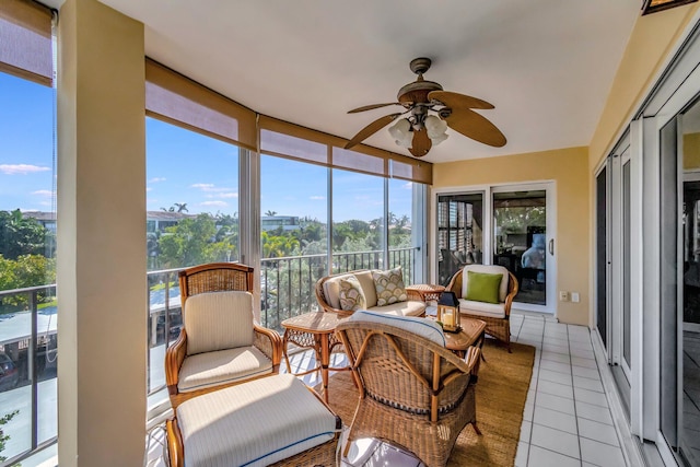 sunroom featuring plenty of natural light and ceiling fan