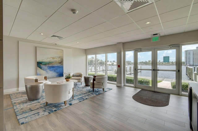 community lobby featuring a water view