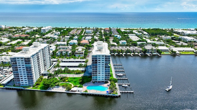 birds eye view of property featuring a water view