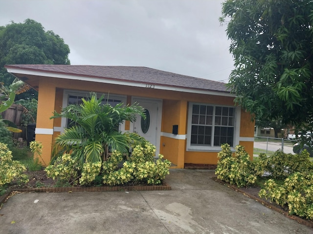 view of front of home with a patio area