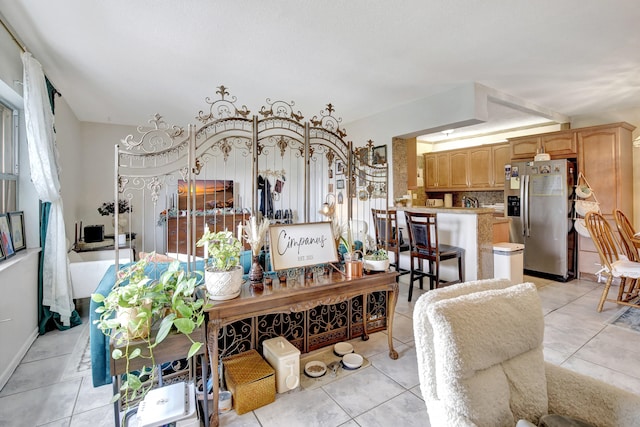 tiled dining room featuring a wealth of natural light