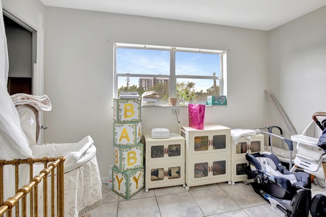 playroom with light tile patterned flooring