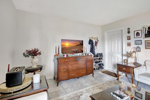 living area with light tile patterned floors
