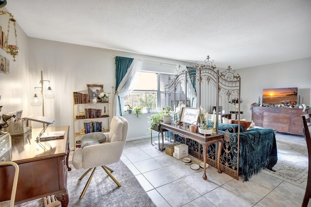 tiled living room with a textured ceiling