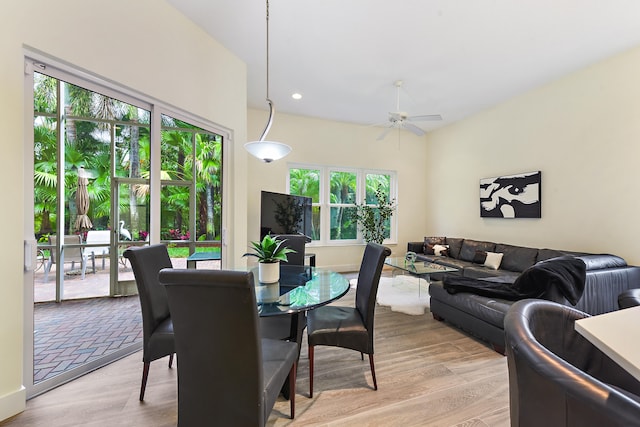 dining area featuring light wood-type flooring, a wealth of natural light, and ceiling fan