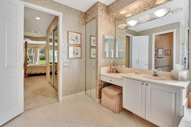 bathroom featuring vanity and tile patterned flooring