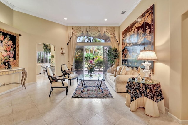 tiled living room featuring crown molding