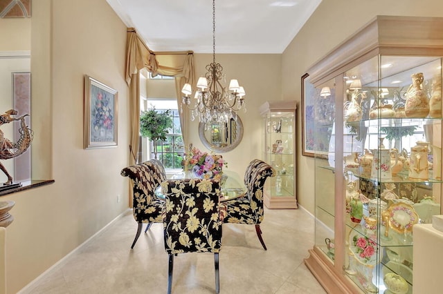 dining space with an inviting chandelier