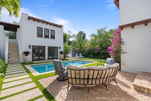 view of swimming pool featuring a patio