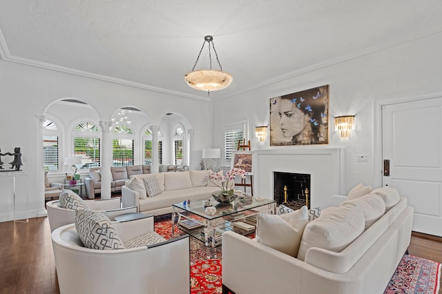 living room with crown molding and dark hardwood / wood-style flooring