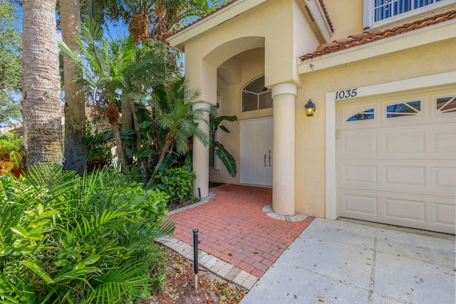 property entrance featuring a garage