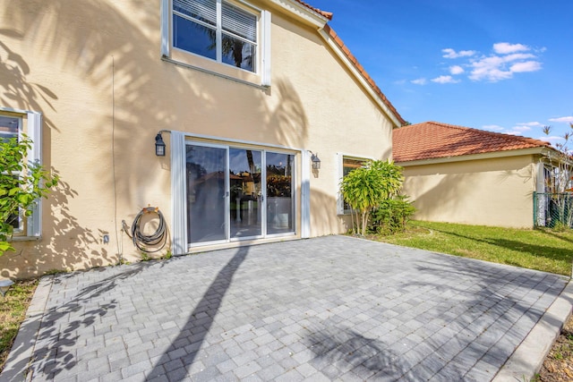 rear view of house with a patio area