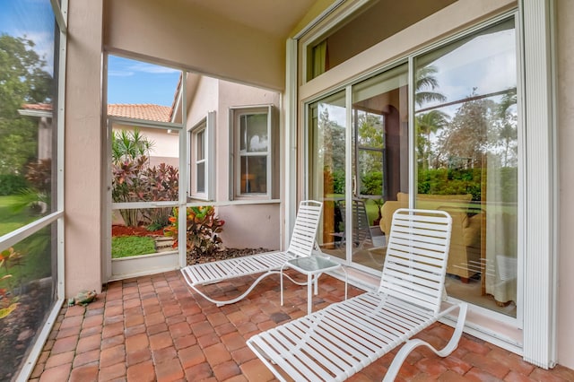 unfurnished sunroom with a wealth of natural light