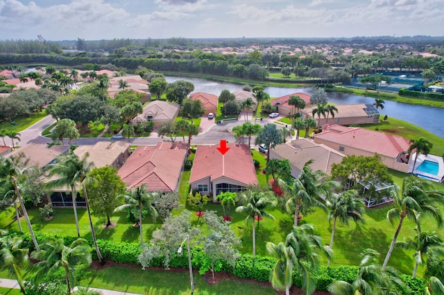 bird's eye view with a water view