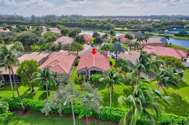 bird's eye view with a water view