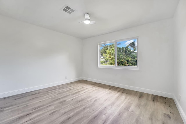 unfurnished room featuring ceiling fan and light hardwood / wood-style flooring