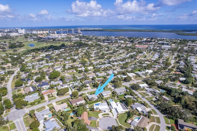 524 Lighthouse Dr, North Palm Beach, FL 33408 - aerial view of property and surrounding area featuring a large body of water and nearby suburban area
