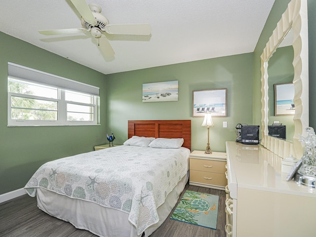 bedroom with hardwood / wood-style floors and ceiling fan