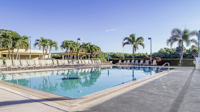 view of swimming pool with a patio area