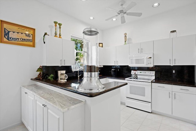 kitchen with white cabinetry, decorative backsplash, kitchen peninsula, and white appliances