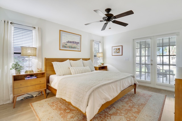 bedroom with french doors, access to outside, light hardwood / wood-style floors, and ceiling fan