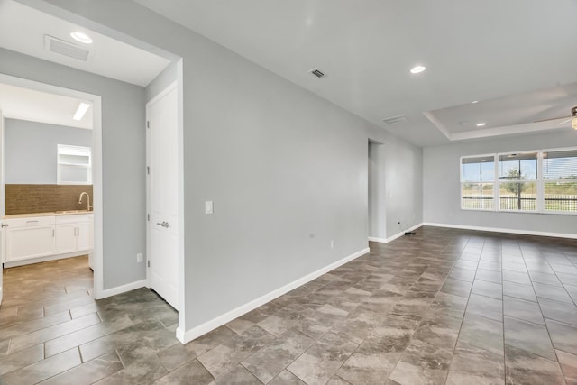 11461 SW Lyra Dr, Port Saint Lucie, FL 34987 - unfurnished room featuring ceiling fan, baseboards, and recessed lighting