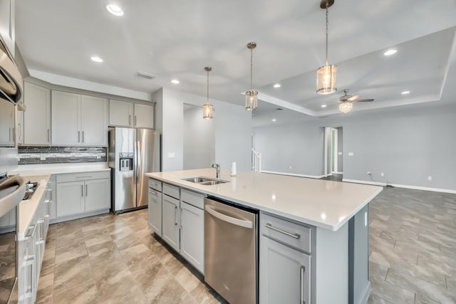 11461 SW Lyra Dr, Port Saint Lucie, FL 34987 - kitchen featuring stainless steel appliances, gray cabinets, a sink, a ceiling fan, and recessed lighting