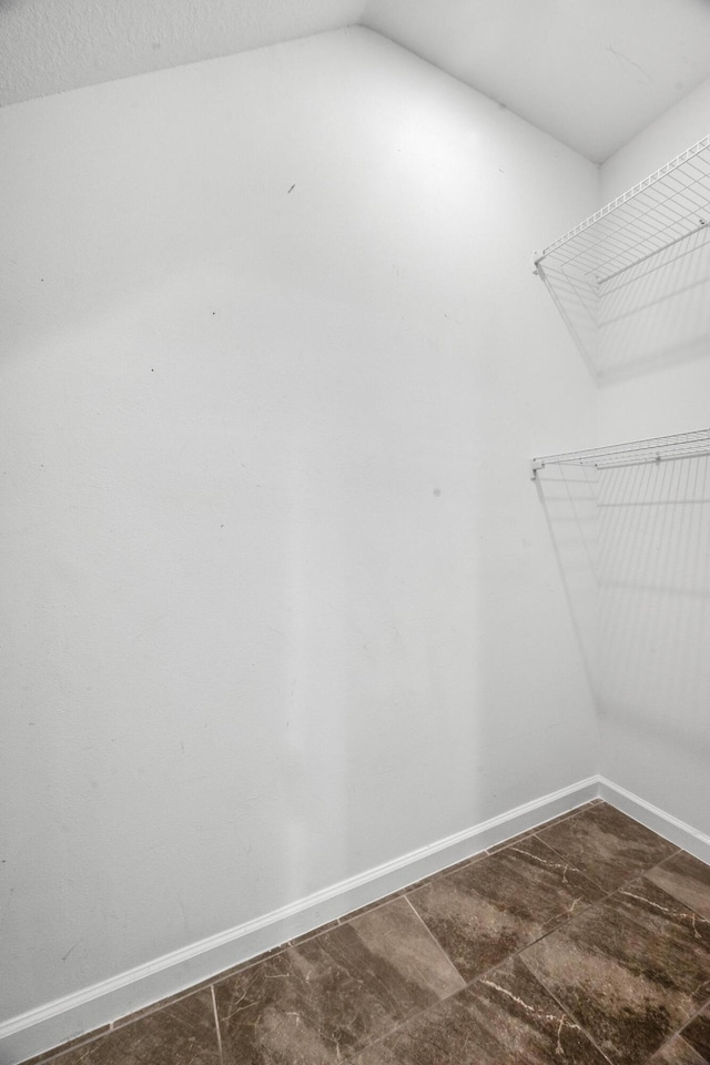 11461 SW Lyra Dr, Port Saint Lucie, FL 34987 - walk in closet with vaulted ceiling