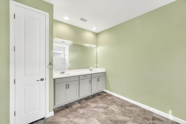11461 SW Lyra Dr, Port Saint Lucie, FL 34987 - full bath featuring baseboards and double vanity