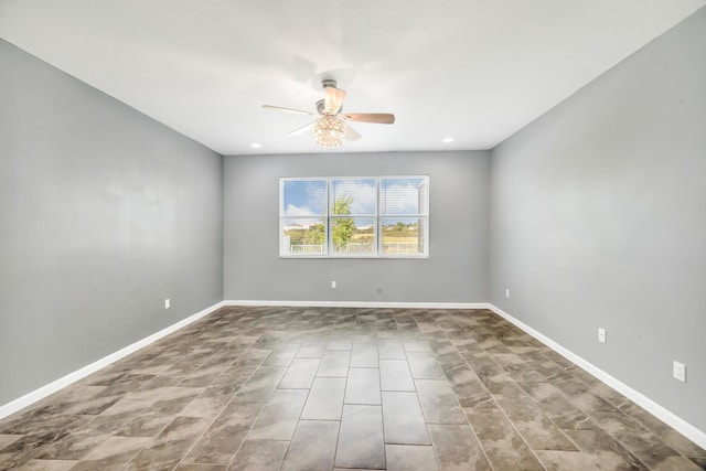 11461 SW Lyra Dr, Port Saint Lucie, FL 34987 - empty room featuring a ceiling fan and baseboards