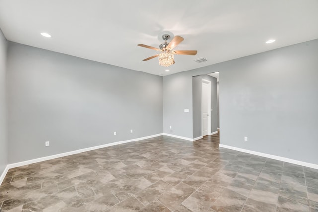 11461 SW Lyra Dr, Port Saint Lucie, FL 34987 - empty room with a ceiling fan, recessed lighting, and baseboards