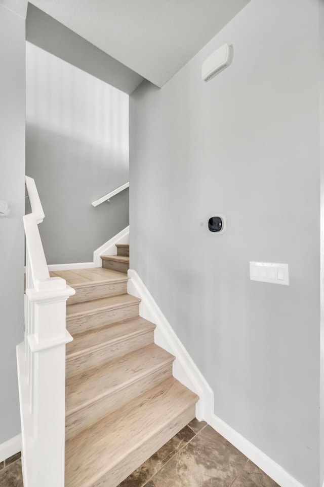 11461 SW Lyra Dr, Port Saint Lucie, FL 34987 - stairs with baseboards
