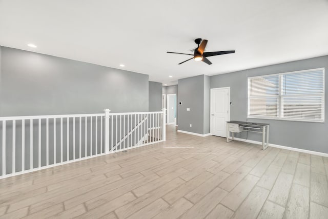11461 SW Lyra Dr, Port Saint Lucie, FL 34987 - empty room featuring wood finished floors, ceiling fan, baseboards, and recessed lighting