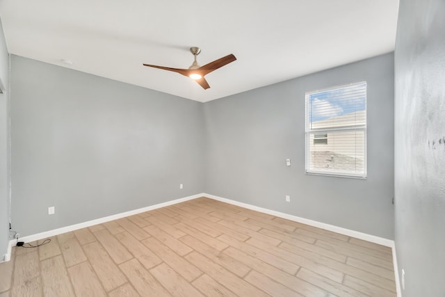 11461 SW Lyra Dr, Port Saint Lucie, FL 34987 - unfurnished room featuring light wood-style flooring, ceiling fan, and baseboards
