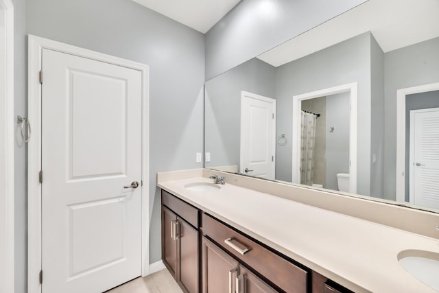 11461 SW Lyra Dr, Port Saint Lucie, FL 34987 - full bathroom featuring double vanity and toilet