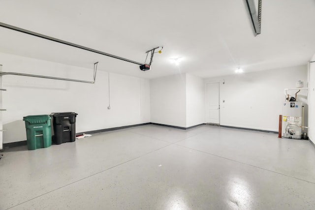 11461 SW Lyra Dr, Port Saint Lucie, FL 34987 - garage featuring gas water heater and a garage door opener