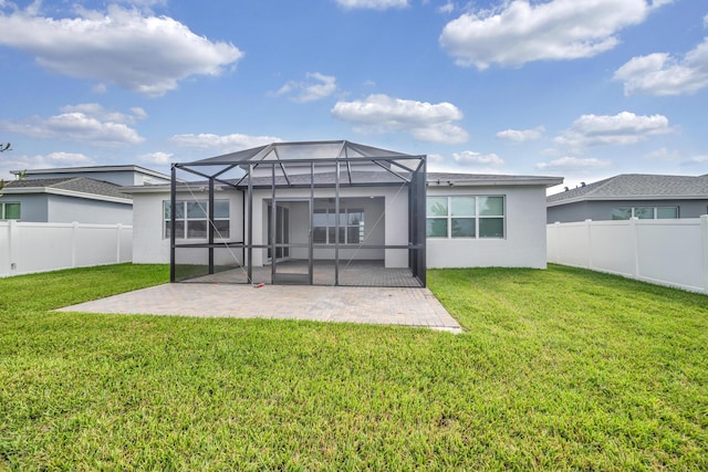 11461 SW Lyra Dr, Port Saint Lucie, FL 34987 - back of property featuring a patio, stucco siding, and a lanai