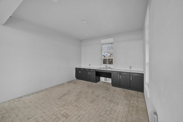 11461 SW Lyra Dr, Port Saint Lucie, FL 34987 - bar area with brick patterned floors and a sink