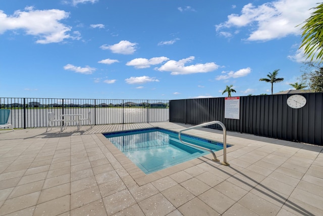 11461 SW Lyra Dr, Port Saint Lucie, FL 34987 - view of pool with a swimming pool, fence, and a patio area