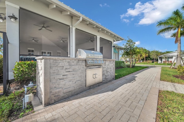 11461 SW Lyra Dr, Port Saint Lucie, FL 34987 - view of patio featuring area for grilling and ceiling fan
