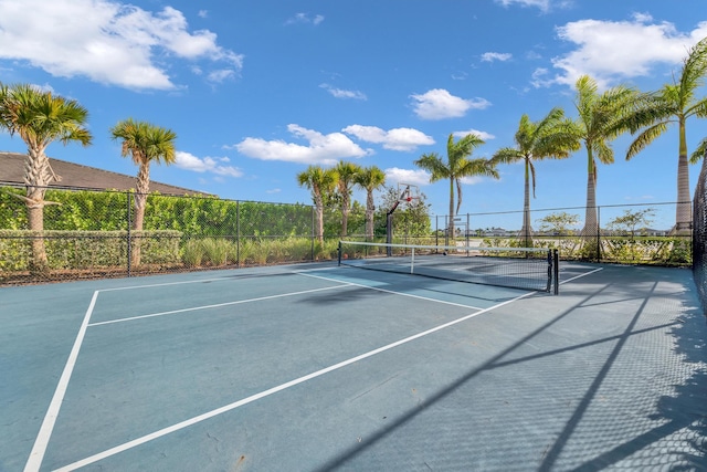 11461 SW Lyra Dr, Port Saint Lucie, FL 34987 - view of tennis court featuring fence and community basketball court