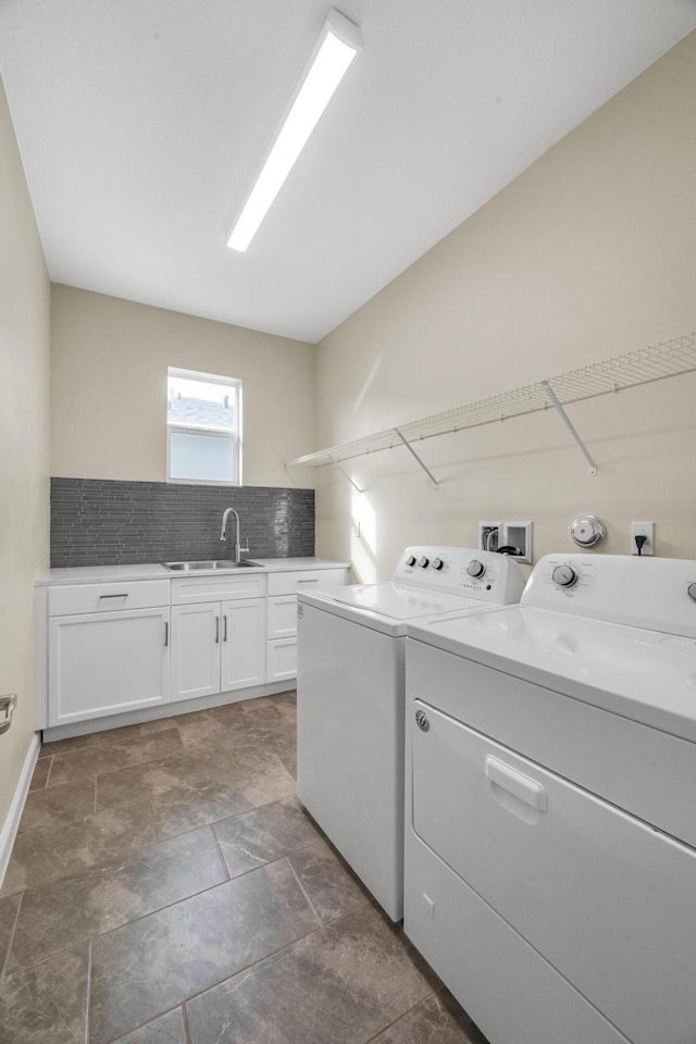 11461 SW Lyra Dr, Port Saint Lucie, FL 34987 - clothes washing area with separate washer and dryer, cabinet space, and dark stone finish flooring