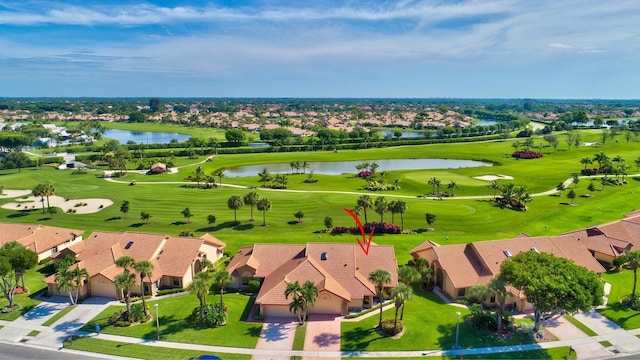 drone / aerial view with a water view